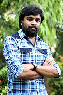 Director M Sasikumar at the Thalaimuraigal Team Press Meet showing their National Award for 2013.jpg