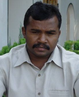 விநாயகமூர்த்தி-முரளிதரன்.jpg