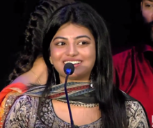 Anandhi at MANNAR VAGAIYARA audio launch2.png